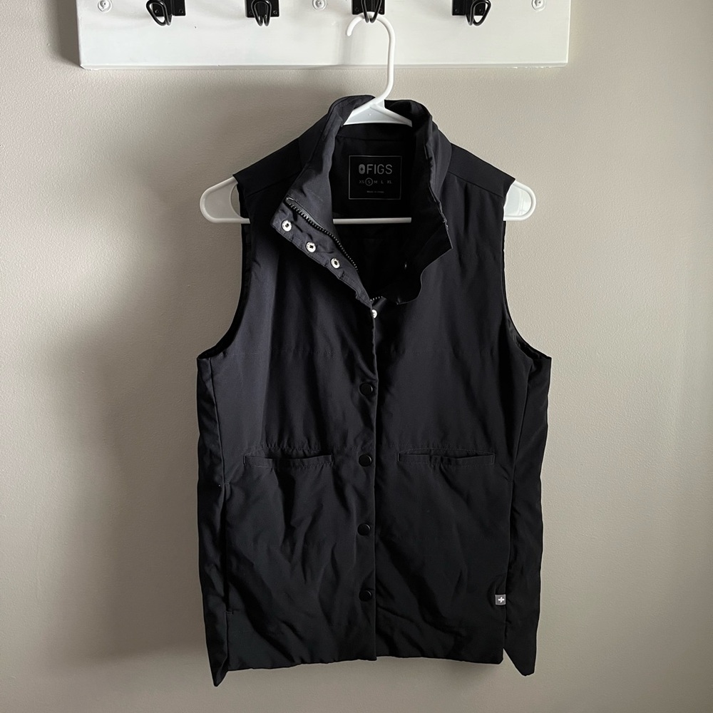 FIGS zip up/button up puffy vest.